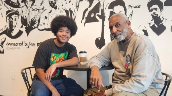 Knight School of Communications student Jaylen Jones sits down with Ken Koontz to talk about local news at Archive CLT. Photo by Jaylen Jones, Queens University News Service.