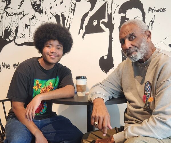 Knight School of Communications student Jaylen Jones sits down with Ken Koontz to talk about local news at Archive CLT. Photo by Jaylen Jones, Queens University News Service.